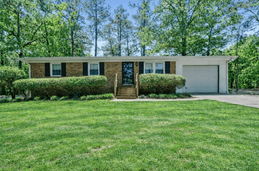 Brick ranch home on a large tree-lined lot in a North Hills neighborhood