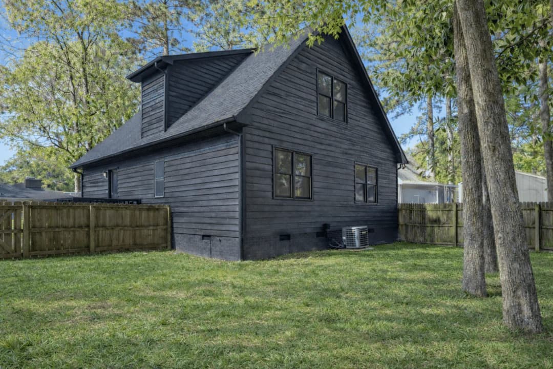Fenced back yard of a CFR single-family rental home